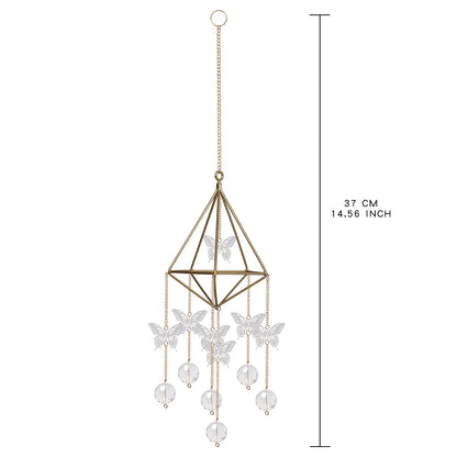 Decorative hanging chandelier with butterfly and pearl elements on a white background